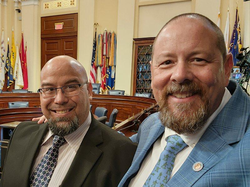 Todd Strader and Tim Grossman in a congressional committee hearing room
